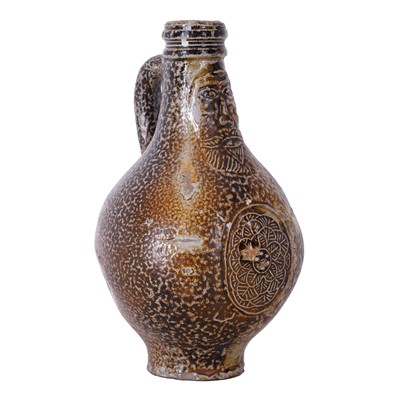 Lot 272 - A German salt glazed stoneware Bellarmine jug. 17th century