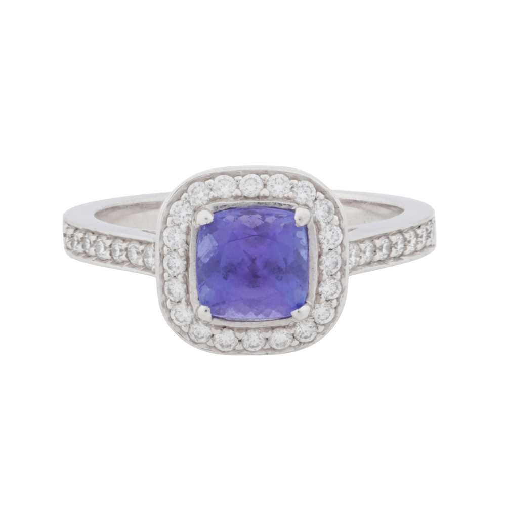 Lot 65 - A diamond and tanzanite halo ring, circa 2011