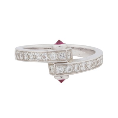 Lot 87 - A diamond and ruby bypass ring