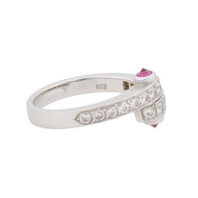 Lot 87 - A diamond and ruby bypass ring