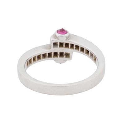 Lot 87 - A diamond and ruby bypass ring