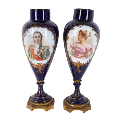 Lot 278 - A pair of French Sèvres style cobalt blue porcelain portrait vases