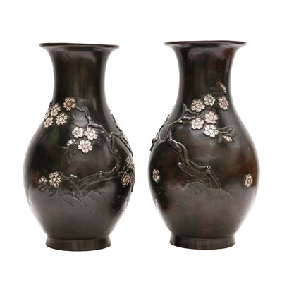 Lot 97 - A pair of Japanese bronze 'prunus' vases, Meiji period