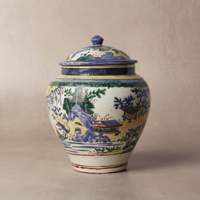 Lot 6 - A rare Japanese Kakiemon 'landscape' jar and cover, Edo period, 17th century
