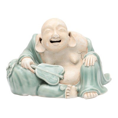 Lot 33 - A Japanese Nabeshima celadon figure of Hotei, Meiji period