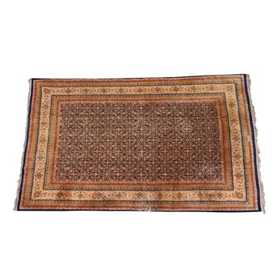Lot 396 - A Large Persian carpet