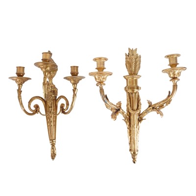Lot 221 - A near pair of French Empire gilt bronze three light appliques