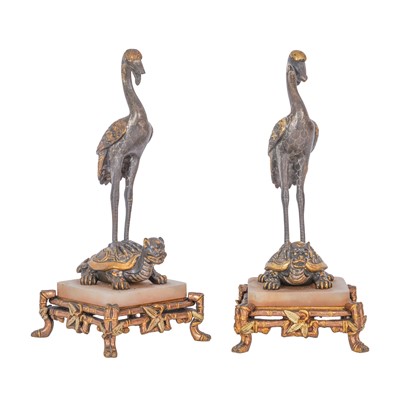 Lot 143 - A pair of French Japonisme parcel gilt and silvered bronze models of cranes