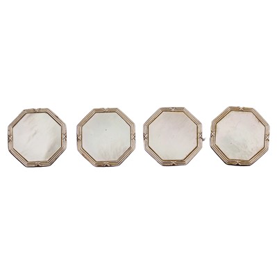 Lot 393 - Four mother of pearl buttons