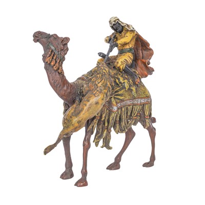 Lot 150 - A Bergman style cold-painted bronze model of an Arab camel rider