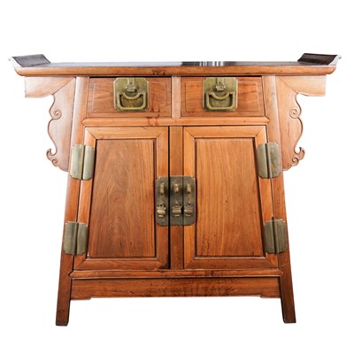 Lot 268 - A Chinese Hardwood three-drawer altar cabinet