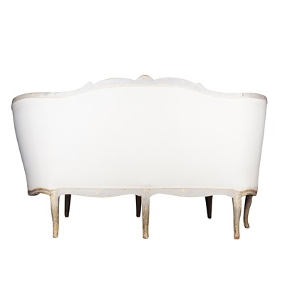Lot 203 - A French Louis XV style painted and parcel-gilt canapé