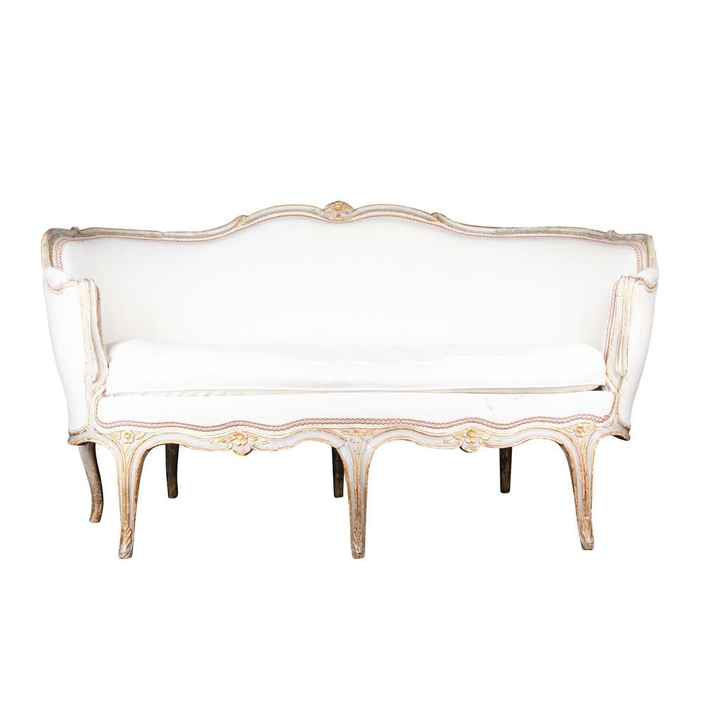 Lot 203 - A French Louis XV style painted and parcel-gilt canapé