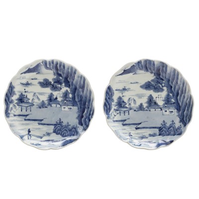 Lot 35 - A pair of Japanese Arita blue and white 'landscape' dishes, Edo period