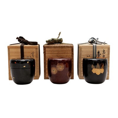 Lot 118 - A group of three Japanese lacquer and maki-e natsume tea caddies, 20th century