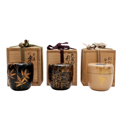Lot 116 - A group of three Japanese lacquer and maki-e natsume tea caddies, 20th century