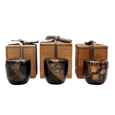 Lot 117 - A group of three Japanese lacquer and maki-e natsume tea caddies, 20th century