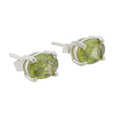 Lot 188 - A pair of oval peridot stud earrings