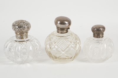 Lot 447 - Three late Victorian crystal cut glass scent...