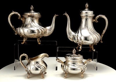 Lot 355 - A late 19th century German four-piece tea and...