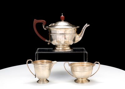 Lot 466 - A George V silver three-piece tea service,...