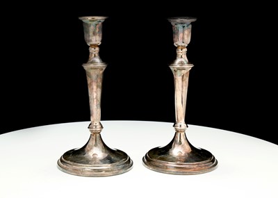 Lot 405 - A pair of Elizabeth II silver candlesticks,...