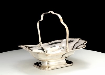 Lot 413 - An Edwardian silver swing-handled basket,...