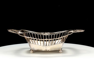 Lot 410 - A George III sterling silver basket, Sheffield...