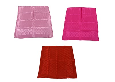 Lot 304 - Three Hermes 'H' silk squares, in shades of...