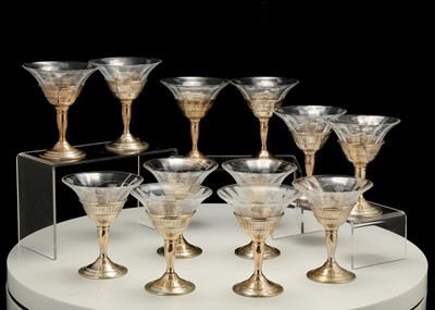 Lot 442 - A set of twelve sterling silver-mounted...