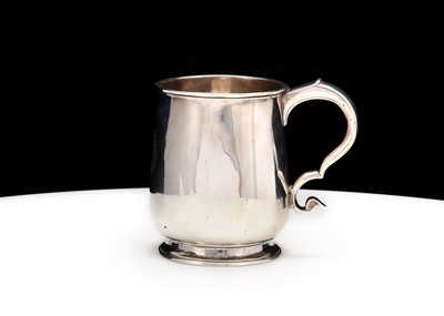 Lot 495 - A George I antique sterling silver mug, London...
