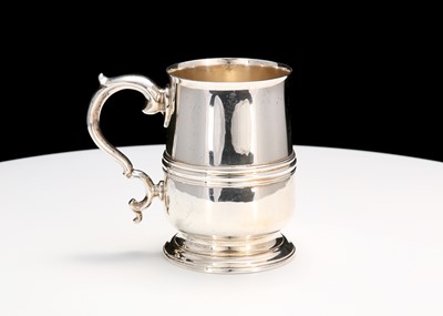 Lot 373 - An Elizabeth II sterling silver mug, London...