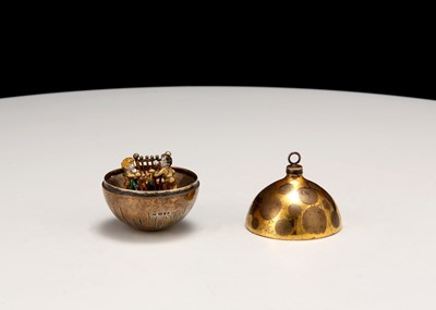 Lot 428 - An Elizabeth II parcel-gilt surprise bauble,...