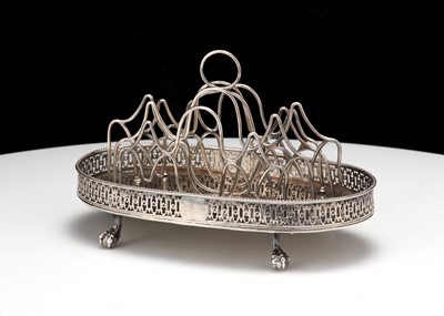 Lot 449 - A George III white metal toast rack, possibly...