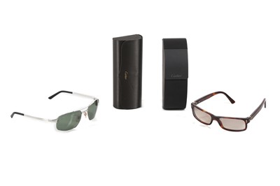 Lot 375 - Two pairs of men's Cartier sunglasses,...