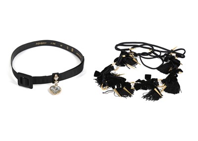 Lot 592 - Two Yves Saint Laurent belts, one black satin...