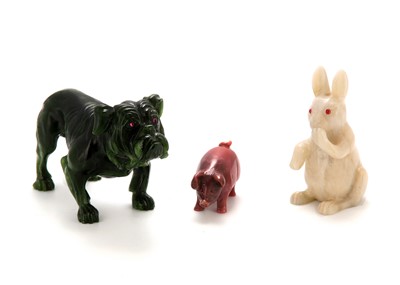 Lot 131 - Three 20th century hardstone animals,...