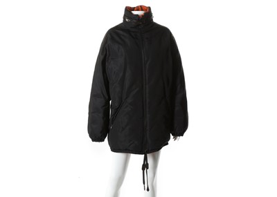 Lot 559 - Hermes reversible black silk puffer...