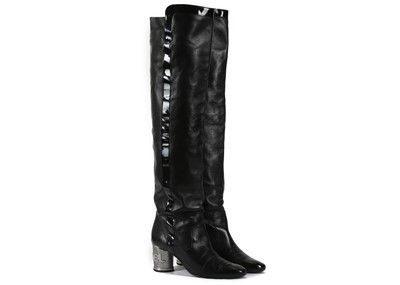 Lot 594 - Chanel knee-high black leather boots, calf...
