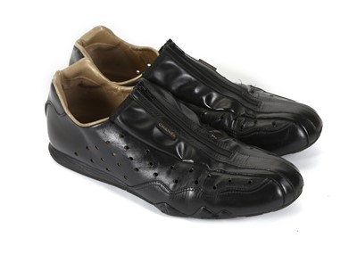 Lot 509 - Chanel black leather cycle style trainers,...