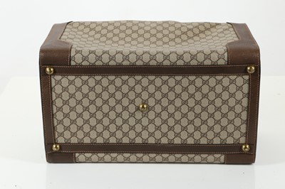 Lot 314 - Three monogram Gucci travel bags, 1990s, brown...