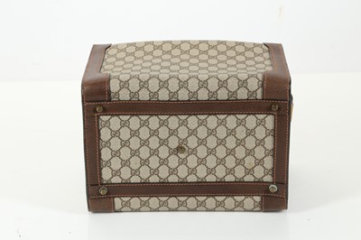 Lot 314 - Three monogram Gucci travel bags, 1990s, brown...