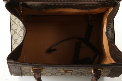 Lot 314 - Three monogram Gucci travel bags, 1990s, brown...