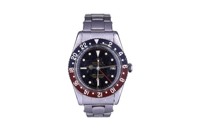 Lot 10 - ROLEX. A STAINLESS STEEL AUTOMATIC DUAL TIME...