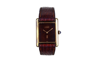 Lot 19 - CARTIER. A .925 SILVER GILT MANUAL WIND...
