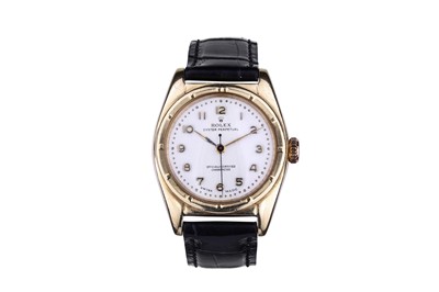 Lot 13 - ROLEX. A 10K GOLD AUTOMATIC CHRONOMETER...
