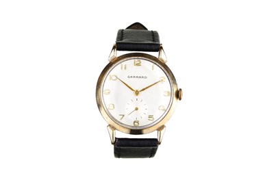 Lot 55 - GARRARD. A 9K GOLD MANUAL WIND WRISTWATCH....
