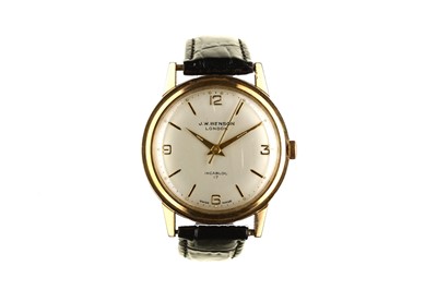 Lot 57 - J.W.BENSON. A 9K GOLD MANUAL WIND WRISTWATCH....