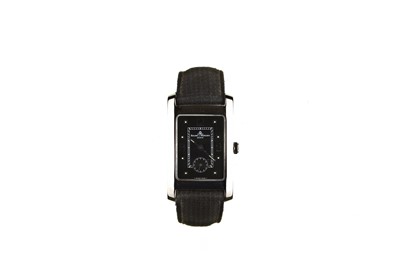 Lot 53 - BAUME & MERCIER. A STAINLESS STEEL QUARTZ...