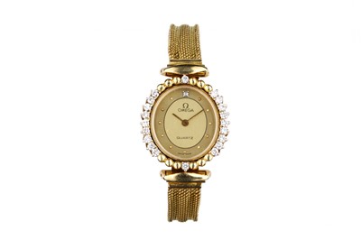 Lot 59 - OMEGA. AN 18K GOLD AND DIAMOND SET QUARTZ...